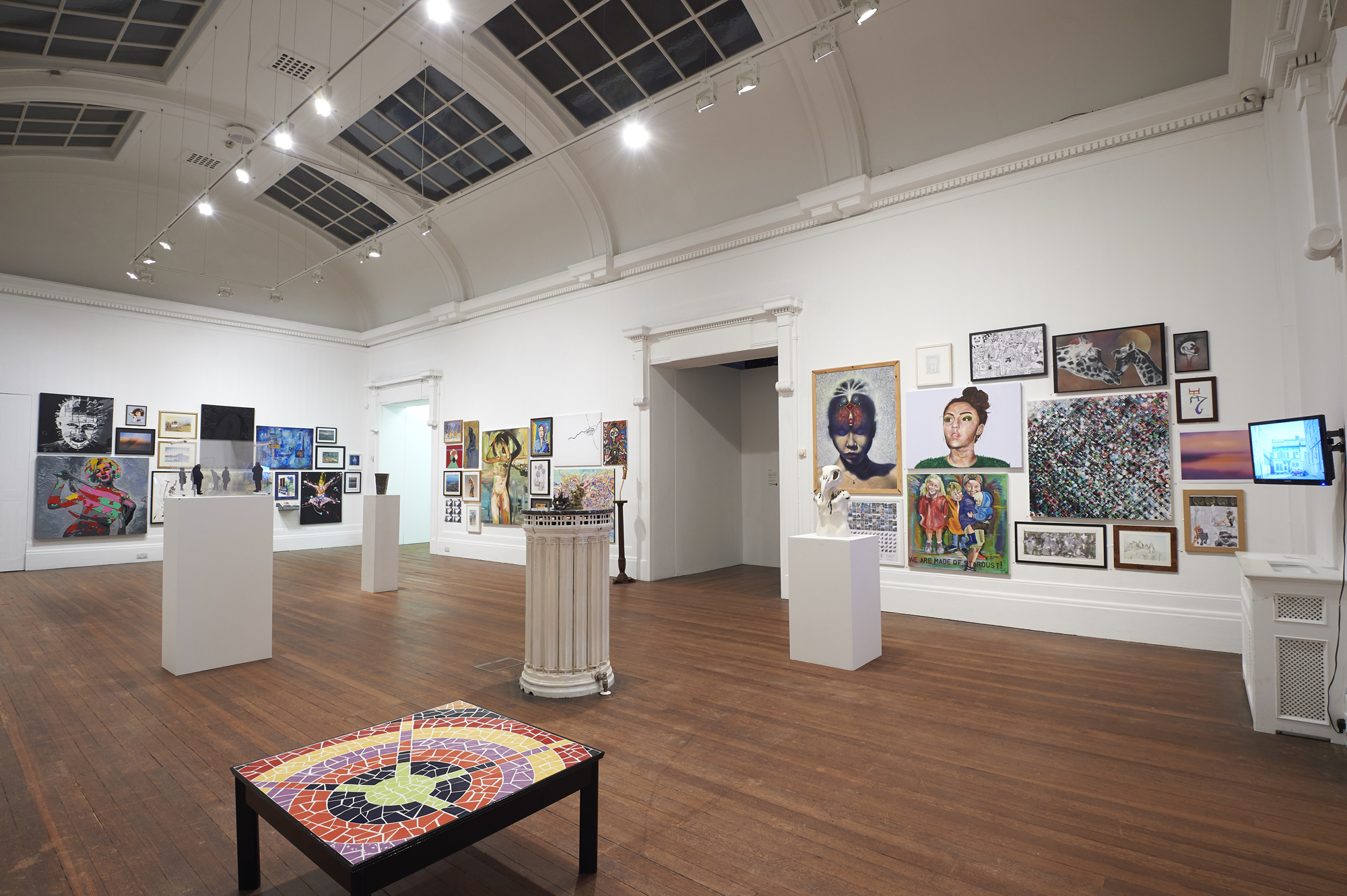 Various artworks on walls and freestanding. these works are from The Grundy Art Gallery's annual Open Show, where residents of the North West area can submit their artwork for exhibition in the gallery.