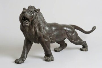 Various artworks. The artworks of display are small black and red ink drawings of human figure and face, large blow up of fanzine cover, and a cluster of drawings and patterns on brightly coloured paper. The works were included in the exhibition Social Club.