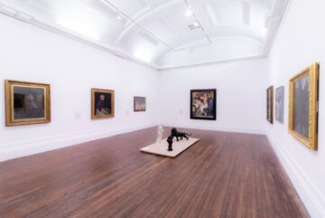 Members of the public with dog face painting on Blackpool's Promanade. Part of the Blackpool Pet Tastic event.